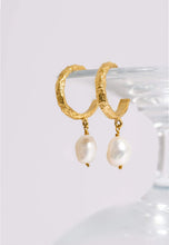 Load image into Gallery viewer, Earrings with freshwater pearl pendants.
